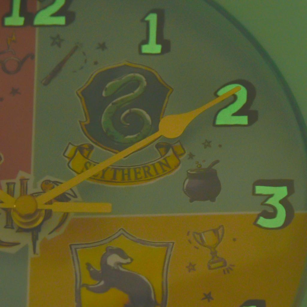 HARRY POTTER - The Four Houses - 'Glow In The Dark' Wall Clock